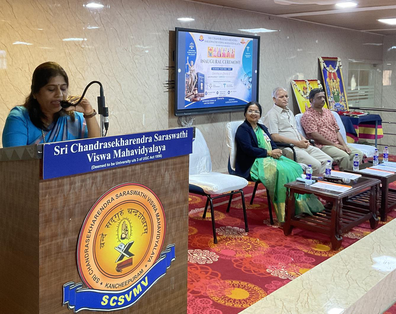 Inaugural address with dignitaries on the dais