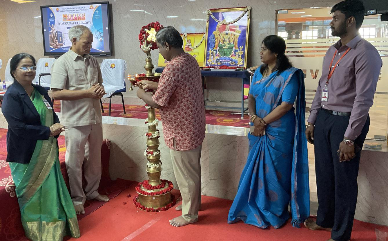 Lamp lighting with dignitaries at the inaugural ceremony